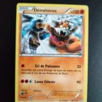 Démétéros 58/111. Carte du JCC Pokémon issue de la série Poings Furieux du bloc XY (XY03, XY: Poings Furieux), parue le 23/08/2014. Carte Pokémon de Base de type Combat, Rare. Illustrateur: PLANETA. L'illustration représente un personnage serpentin s'apprêtant à donner un coup de poing.