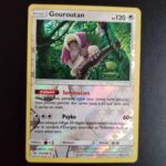 Gouroutan (reverse) 113/149. Carte du TCG Pokémon issue de la série Soleil et Lune du bloc Soleil et Lune (SL01, SL: Soleil et Lune), parue le 03/02/2017. Carte Pokémon de Base de type Incolore. Rare. Illustrateur: Mitsuhiro Arita. L'illustration représente un singe blanc perché sur une branche dans une jungle.