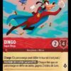 DINGO Super Dingo 107/204. Carte du jeu de cartes à collectionner Disney Lorcana issue du Chapitre 4 Le Retour D'Ursula (URR), paru le 31/05/2024. Carte Personnage, Rubis. Rare. Illustrateur: Justin Runfola. L'illustration représente le personnage Dingo, un chien humanoïde déguisé en super héros et en train de voler à proximité d'un oiseau étonné.